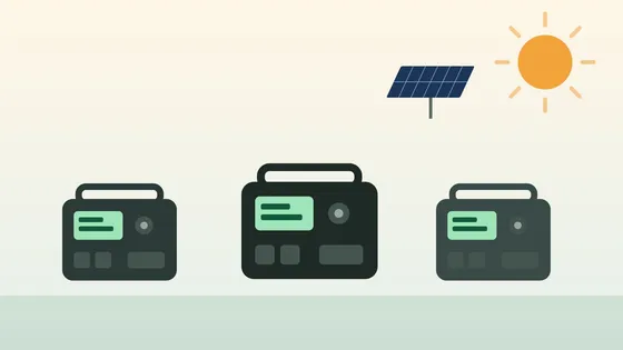 Illustration of several portable power stations of different sizes next to a solar panel